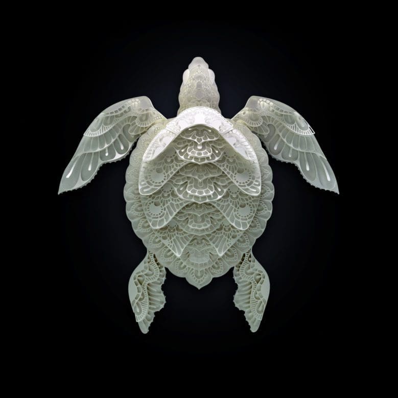 Delicate paper cuts of endangered animals